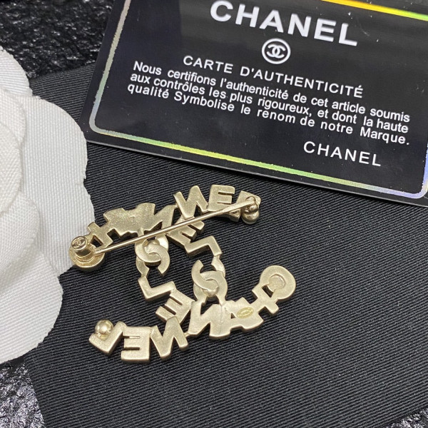CL BROOCH