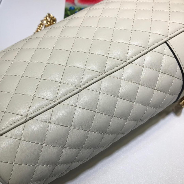 G*u*i quilted leather belt bag